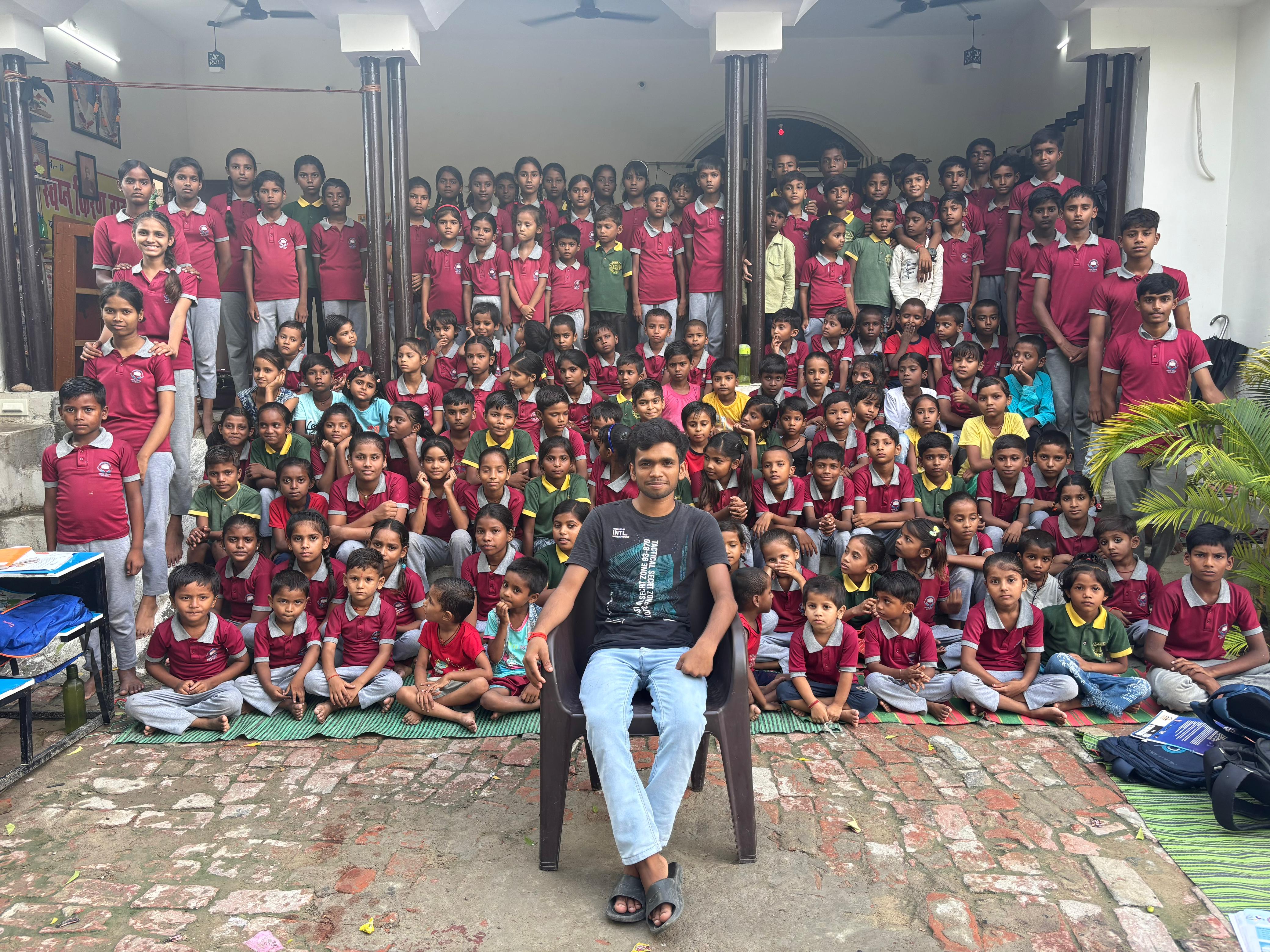 Aditya with many students in background